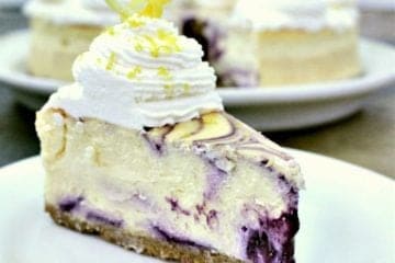 Lemon Blueberry Swirl Cheesecake. An epic spinoff from a classic cheesecake, blown up with blueberry lemon goodness.