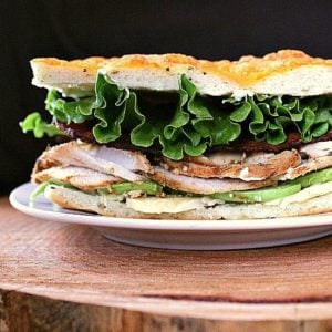 Roast Turkey Avocado Bacon on Focaccia. A fully loaded focaccia sandwich jam packed with roast turkey, avocado, crisp bacon and aged cheddar.