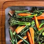 Roasted Broccolini, Green Beans and Carrots. These roasted vegetables are packed with flavour and carry the perfect texture. Crisp broccolini, vibrant carrots, crunchy green beans and roasted garlic play together beautifully to create an epic side dish that knows no bounds.