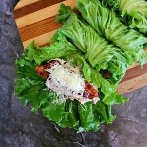 You'll never use a tortilla again after eating these low carb and gluten free, healthy and delicious, Chicken Caesar Salad Lettuce Wraps!