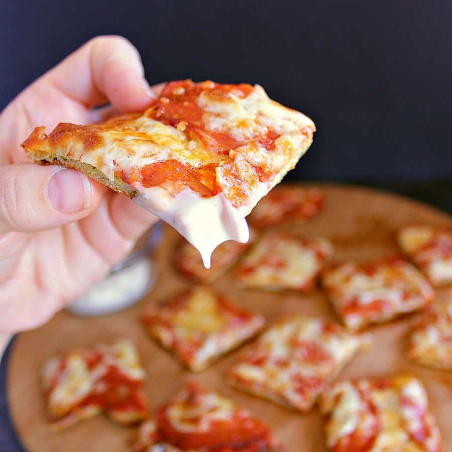 A low carb pizza bite dipped in ranch.