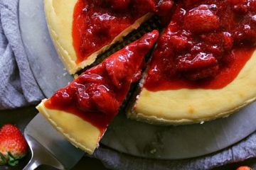 This Classic Cheesecake sings with creamy perfection and is topped with and easy and delicious strawberry sauce. Your guests will be singing all night long!