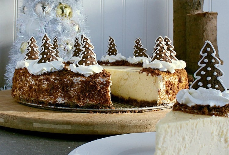 Gingerbread crust cheesecake with one slice removed.