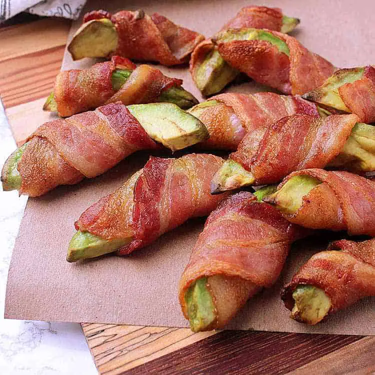 Pile of bacon wrapped avocado fries.