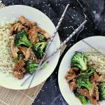 Two bowls of keto teriyaki chicken with cauliflower rice on the side.