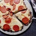 Keto Chicken Pizza Crust with mozzarella and pepperoni.