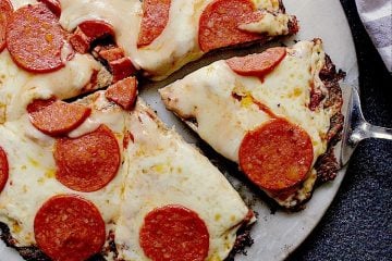 Keto Chicken Pizza Crust with mozzarella and pepperoni.