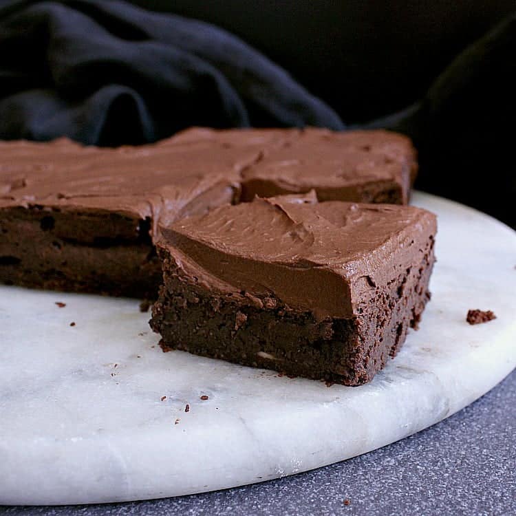 Brownie covered in chocolate frosting.