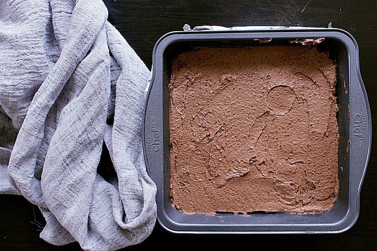 8x8" baking dish, filled with the brownie batter, ready for the oven.