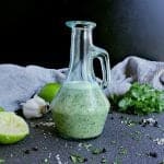 Glass jar filled with keto cilantro lime dressing.