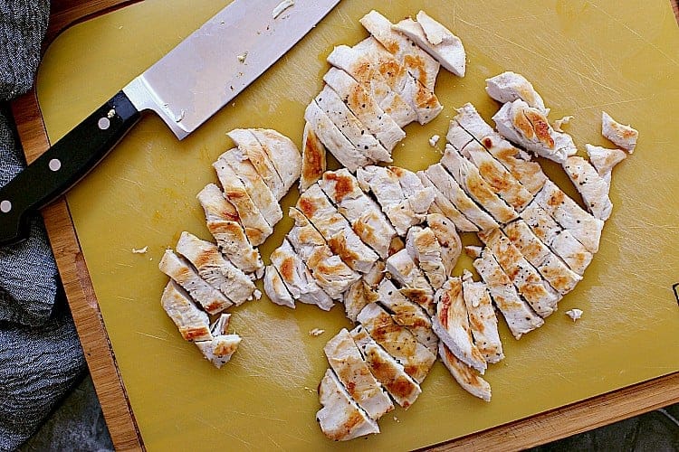 Chicken breasts chopped into slices.