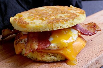 Keto breakfast sandwich on a 90 Second Keto Bread with an egg, cheddar and bacon.