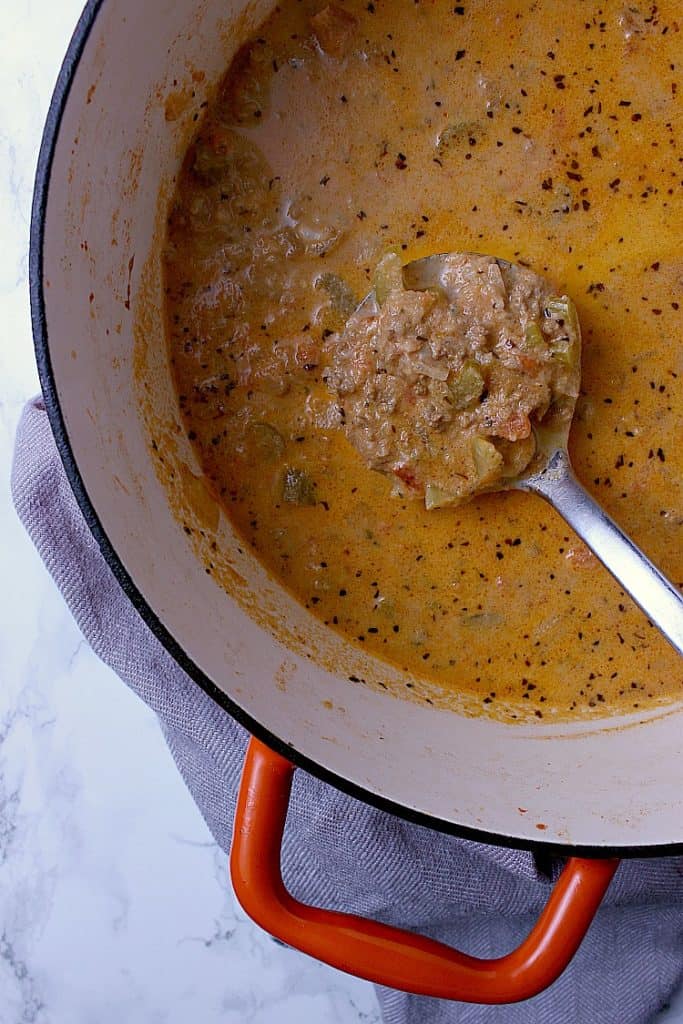 A soup pot with freshly made keto cheeseburger soup, ready to be served.
