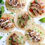 Almond flour tortillas filled with toppings and keto carnitas.