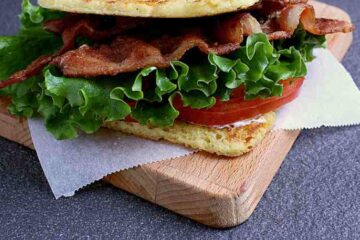 keto blt on a wooden cutting board.